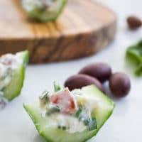 Best Feta Cucumber Salad Bites. The BEST appetizer to make this season! Your favorite Feta Cucumber Salad in Crunchy Bites! Recipe at www.twopurplefigs.com