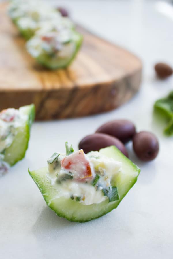 Best Feta Cucumber Salad Bites. The BEST appetizer to make this season! Your favorite Feta Cucumber Salad in Crunchy Bites! Recipe at www.twopurplefigs.com