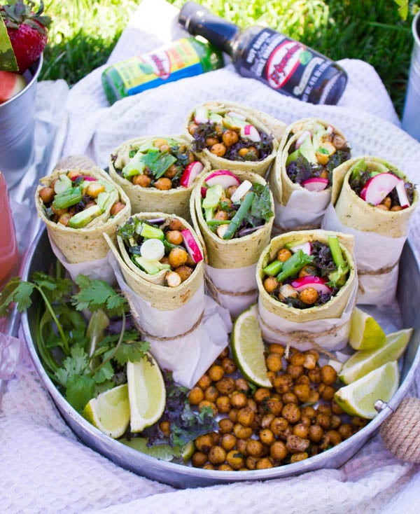 Roasted Chickpeas Wraps on a silver tray served al fresco with summery cocktails and more roasted chickpeas on the side