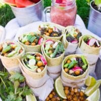 Best Roasted Chickpeas Wrap. Seriously the BEST. Fire Smokey Roasted Chickpeas layered on kale, avocados, radishes, scallions and a tortilla! Get the step by step and my secret sauce which bursts this wrap with flavor! www.twopurplefigs.com