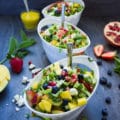 Fruity Greek Salad With Sweet Mango Salad Dressing. This is absolutely my FAVORITE salad recipe! Fresh sweet summer fruits with tangy feta in a sweet Mango Greek Salad Dressing! Summer heaven! www.twopurplefigs.com