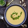 Creamy Peanut Soup with Peanut Crunch Herb Pistou. Authentic African recipe that my family picked up a long time ago, and we've been making/sharing it since then! It's pure peanut LOVE in every sip! www.twopurplefigs.com