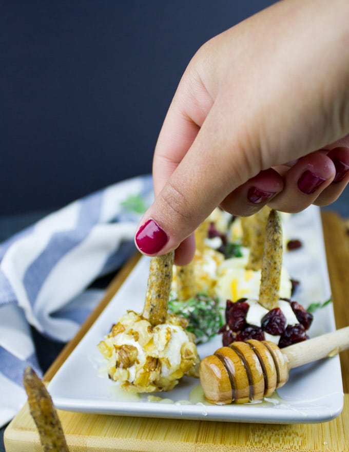 Mini Cheese Ball Recipe Bites. Snacking and finger food has never been so easy, quick and scrumptious! These are a crowd pleaser every time! Full recipe at www.twopurplefigs.com