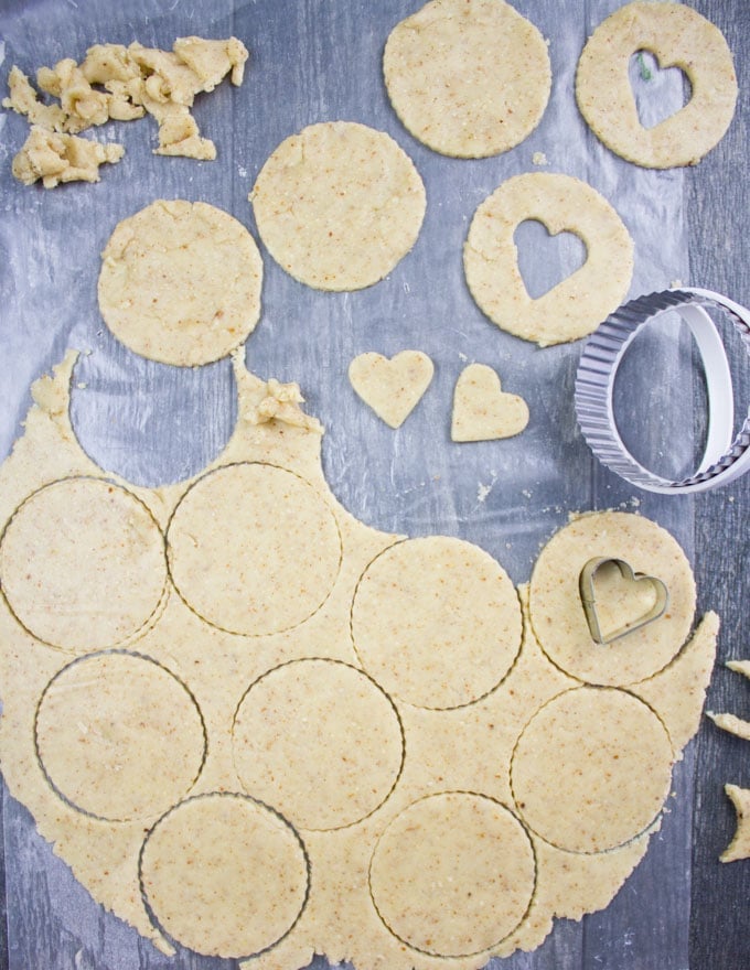 Holiday Maple Linzer Cookies. This delicious twist on a delicious cookie is the BEST! Bake a huge batch of these, they disappear fast! www.twopurplefigs.com