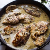 Chicken breasts added back to the walnut sauce for cooking