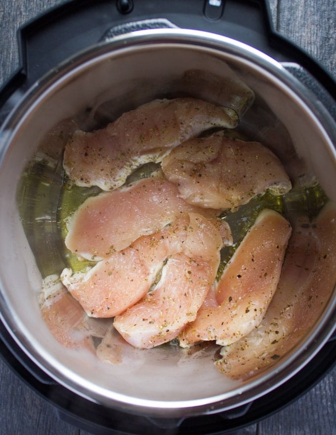 chicken breasts searing in an instant pot