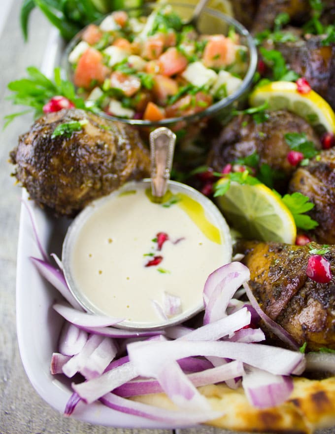 Chicken Shawarma Platter with a small dish filled with Tahini Sauce