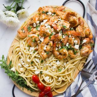 Quick Shrimp Pasta with Garlic Feta Sauce. 15 Minute pasta dish that's light, delicious, easy and loaded with a Mediterranean flare!