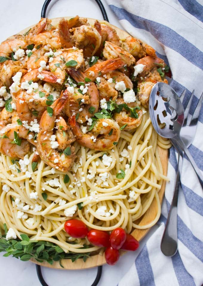 overhead shot of Quick Shrimp Pasta with Garlic Feta Sauce sprinkled with feta and parsley