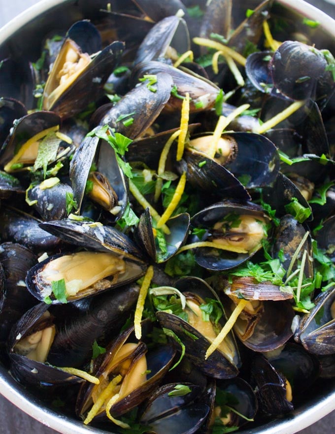 A close up showing how mussels open up during cooking