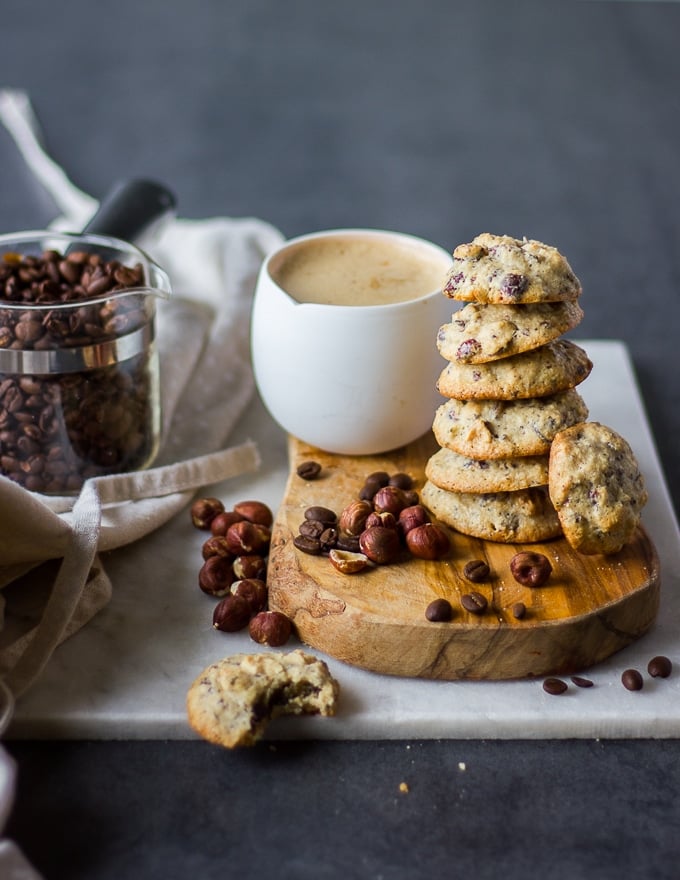 stacks of coffee cookies near a cup of coffee