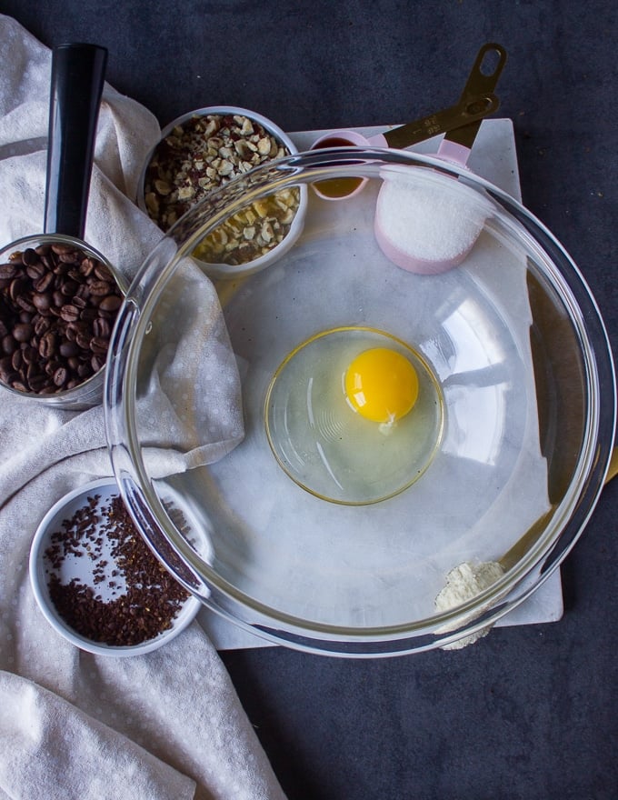 ingredients for coffee cookies: egg, sugar, coffee, nuts, almond flour, vanilla