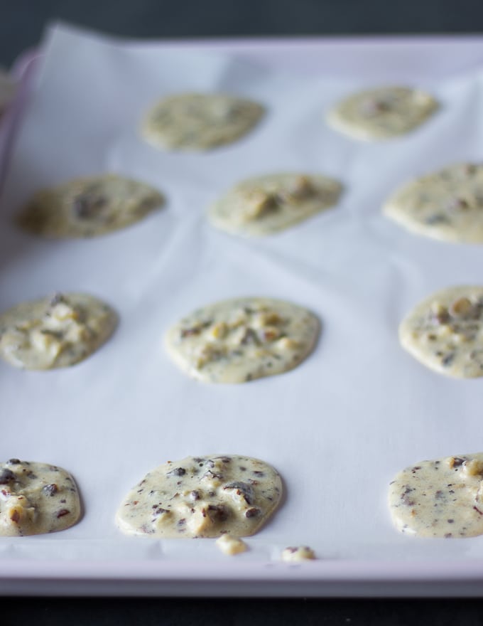 scooped batter of coffee cookies on a baking sheet ready for the oven