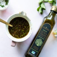 bottle of moroccan olive oil near a bowl of zaatar