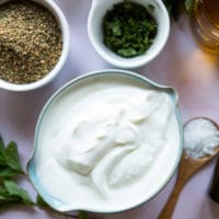 a big bowl of yogurt to be strained for labneh making