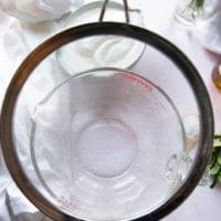 A sieve placed over a large bowl to help srain the yogurt to make labneh recipe