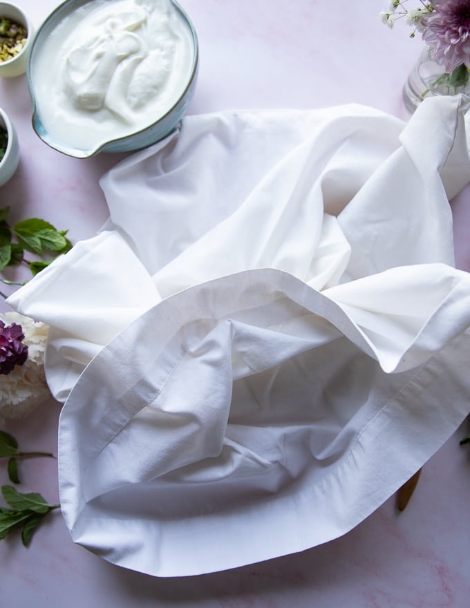 a pillowcase on a marble board which is the best way to make labneh!!