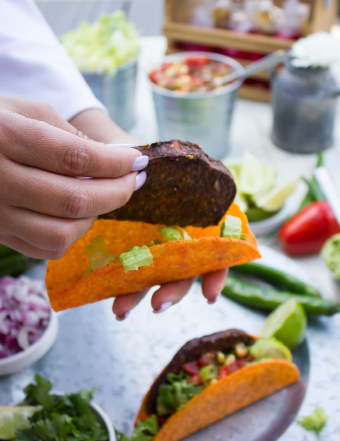 A half burger to be placed inside a taco shell