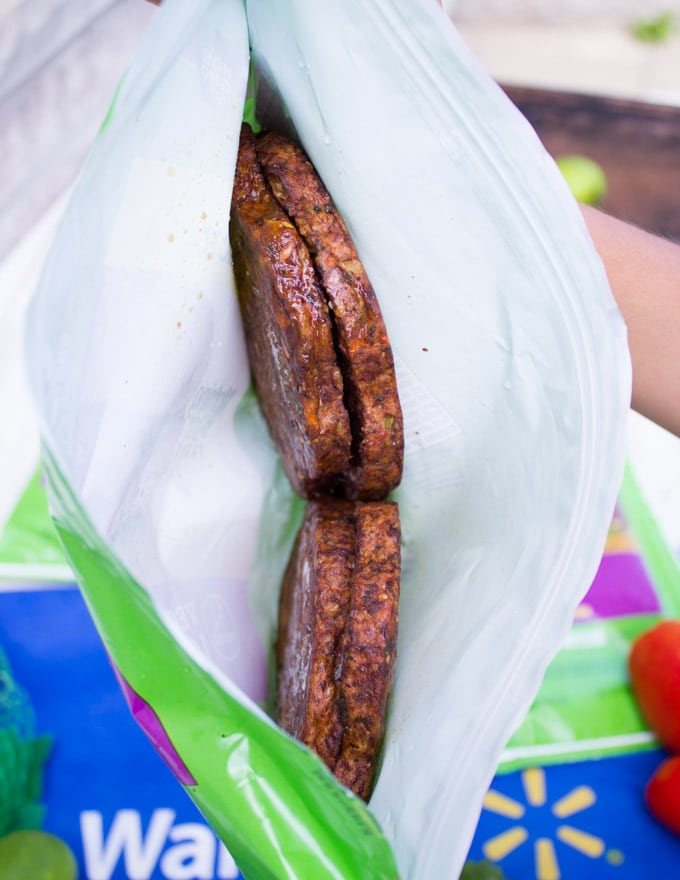 the inside of a bag of the veggie burgers showing the veggies