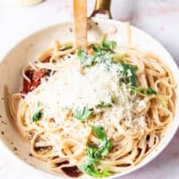 more parmesan cheese is added, and pasta water to make the creamy sauce