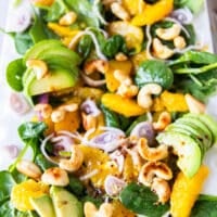 close up of an orange salad plate
