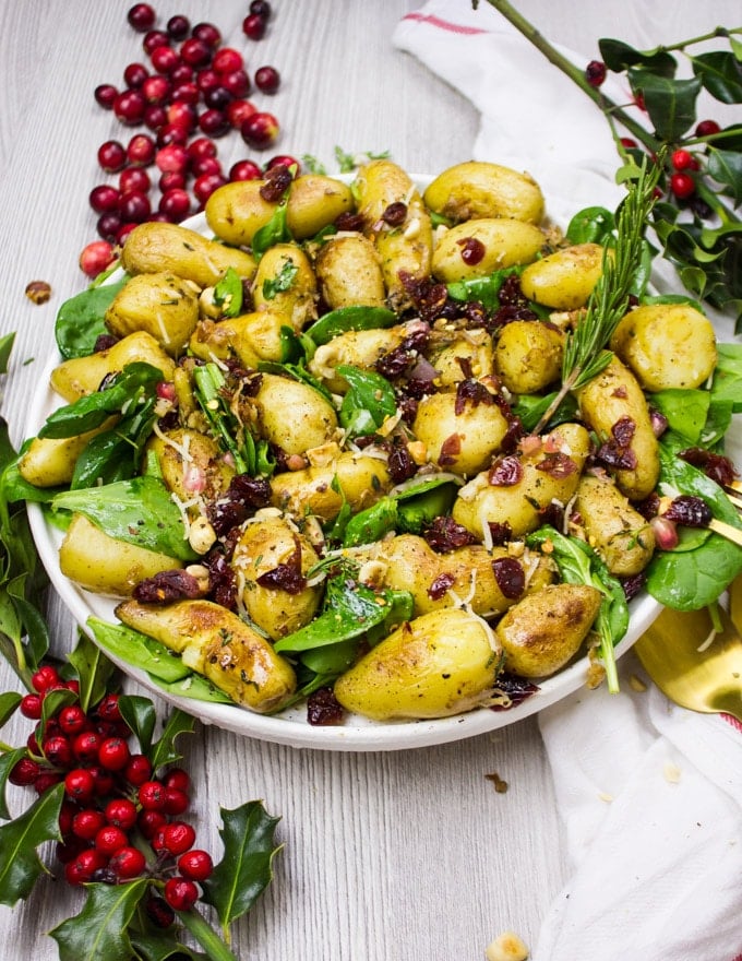 Big Plate of Potato salad with spinach and cranberries