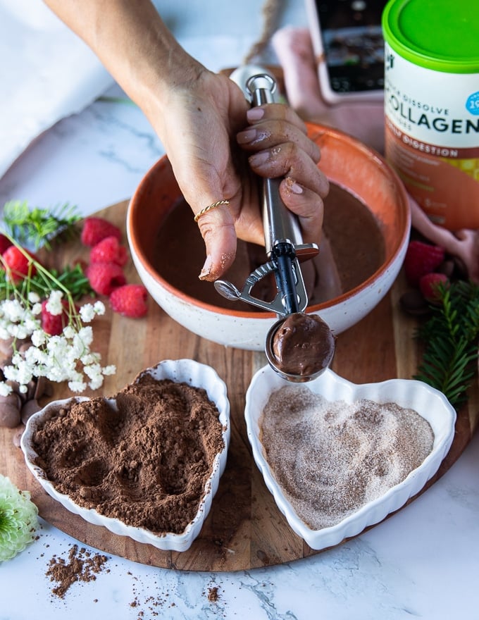 a scoop of chocolate truffle mixture in an ice cream scoop 