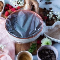 the chocolate truffles mixture covered in plastic wrap