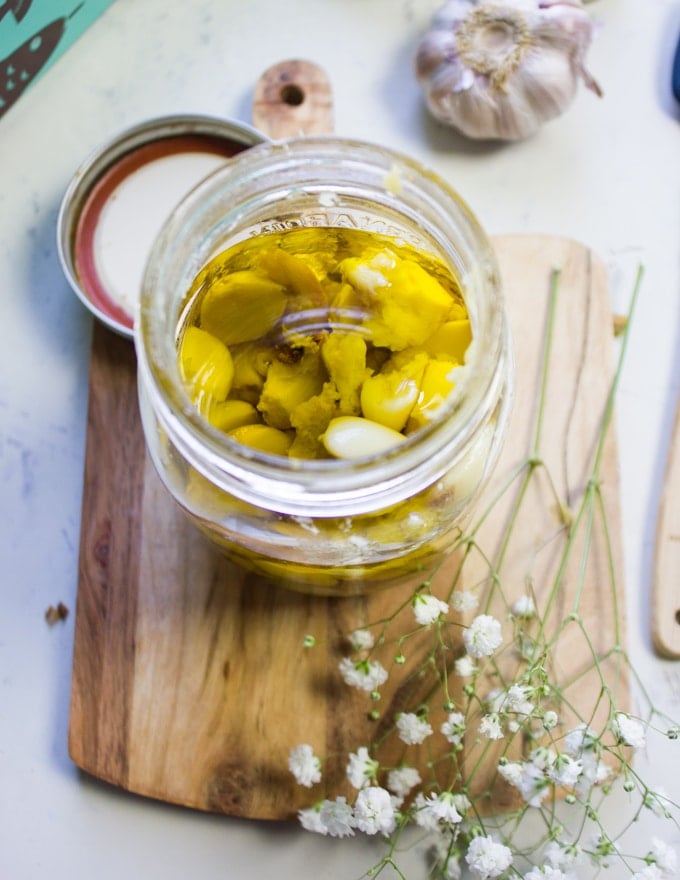 close up of the mason jar with the roasted garlic