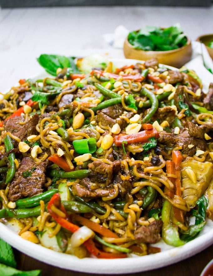 Details of the lamb stir fry in the stir noodles and stir veggies drenched in stir fry sauce