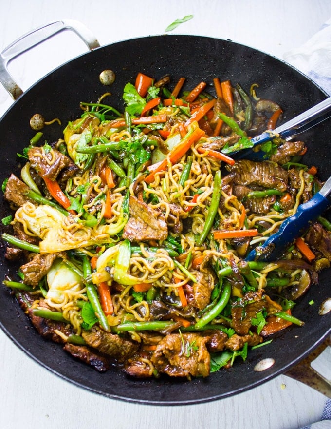 Stir fry ready and fully cooked in the wok with stir fry sauce