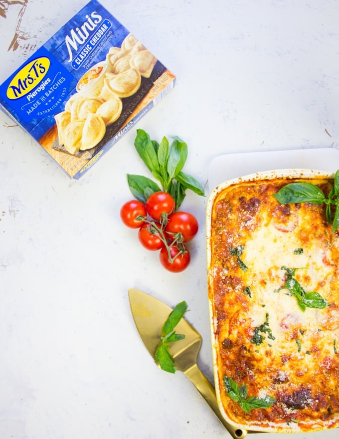 A box of pierogies, some vine ripe tomatoes and half a plate of lasagna