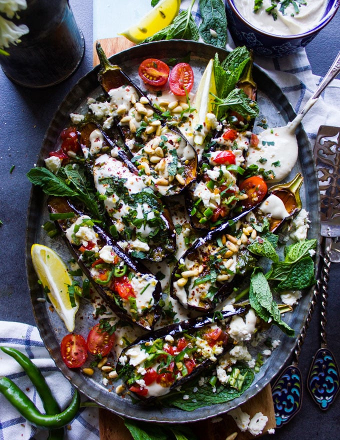 Close up of the eggplant salad plate showing a variety of toppings on the fried eggplants