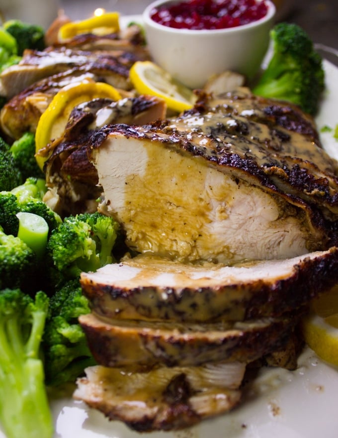 Close up of one slice of turkey breast recipe showing how juicy the turkey breast is!