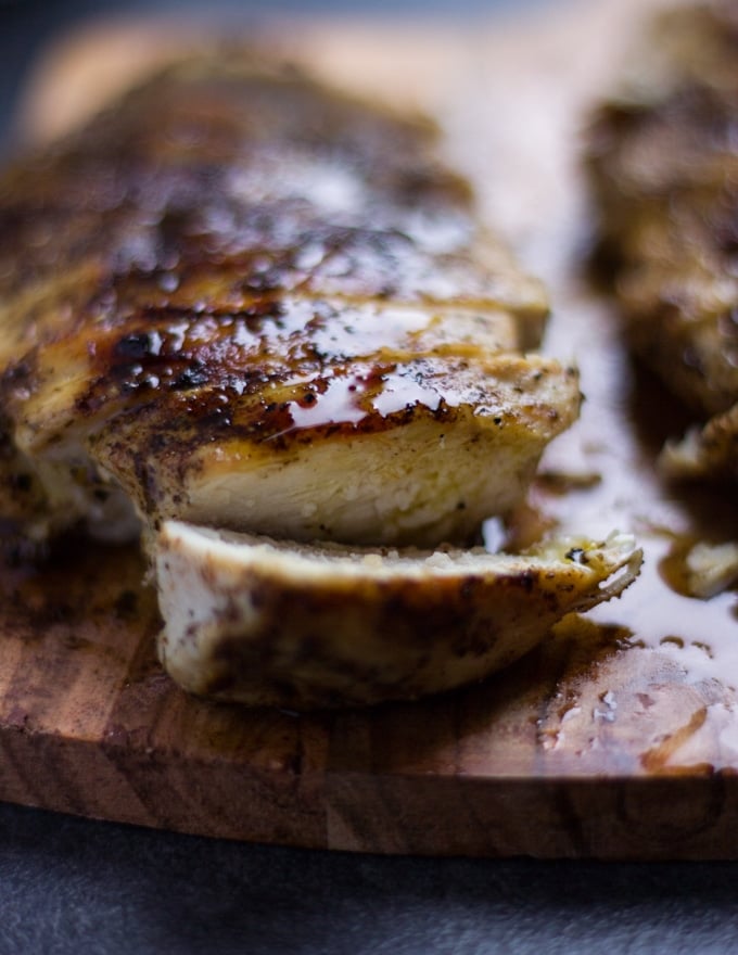 Close up of the grilled chicken showing the juicy chicken breast