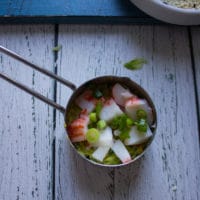 imitation crab meat and scallions are now added in the same measuring cup for the crab sushi