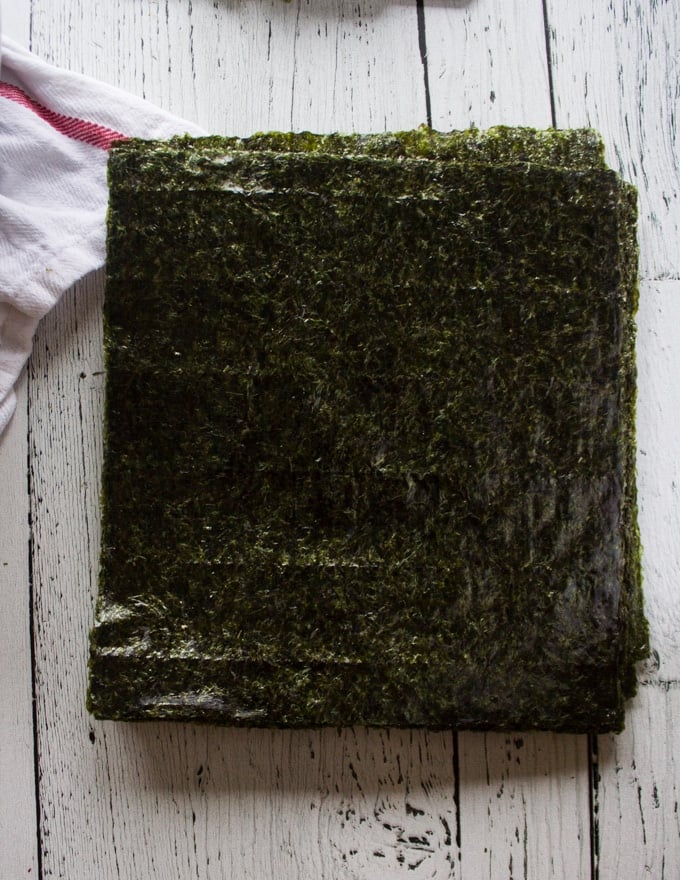 A stack of seaweed sheets to roll the sushi burrito 