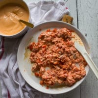 Spicy Salmon sushi mixture ready on a plate for the sushi burrito