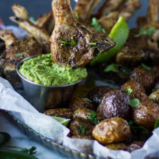 A crispy Air Fryer Lamb Chops Dipped in Poblano Sauce showing the crisp and sauce