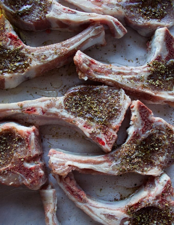 Lamb chops seasoned with the lamb seasoning and drizzled with oil 