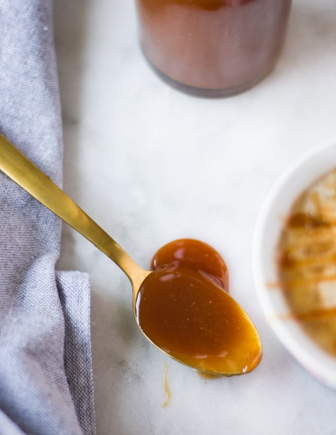 caramel sauce on a spoon.