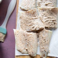 Fillets cut in pieces and coated in mayo mixture