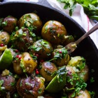 Potatoes in the pan fried with herbs, garlic and spices