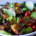 Air fryer chicken legs on a plate and a close up showing one drumstick very crunchy