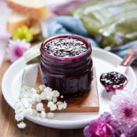 A jar of blackberry jam ready and canned for the fridge or storing