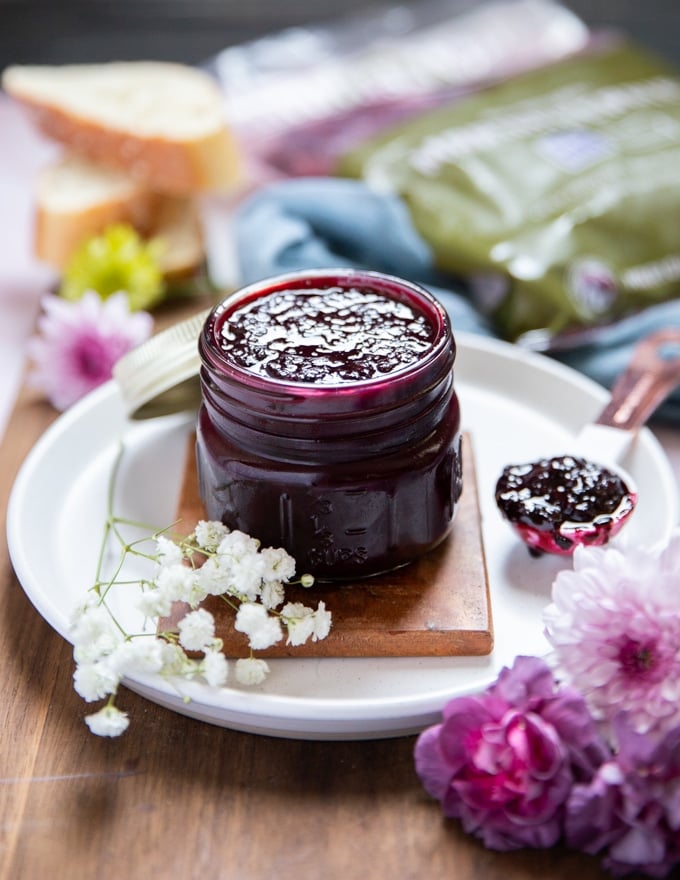 A jar of blackberry jam ready and canned for the fridge or storing