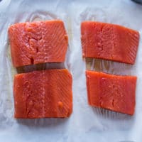 sockeye salmon fillets on a parchment paper