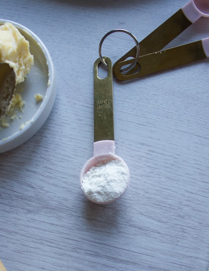 a teaspoon of butter on a board used to thicken the lemon butter sauce