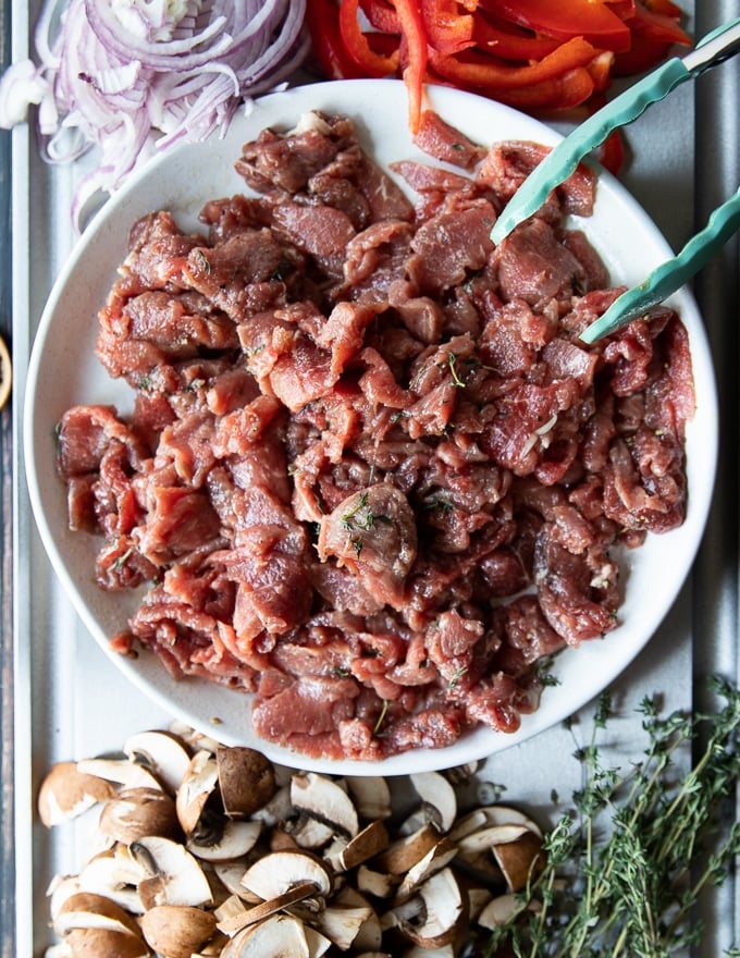 Very thinly sliced meat for the philly cheesesteak recipe