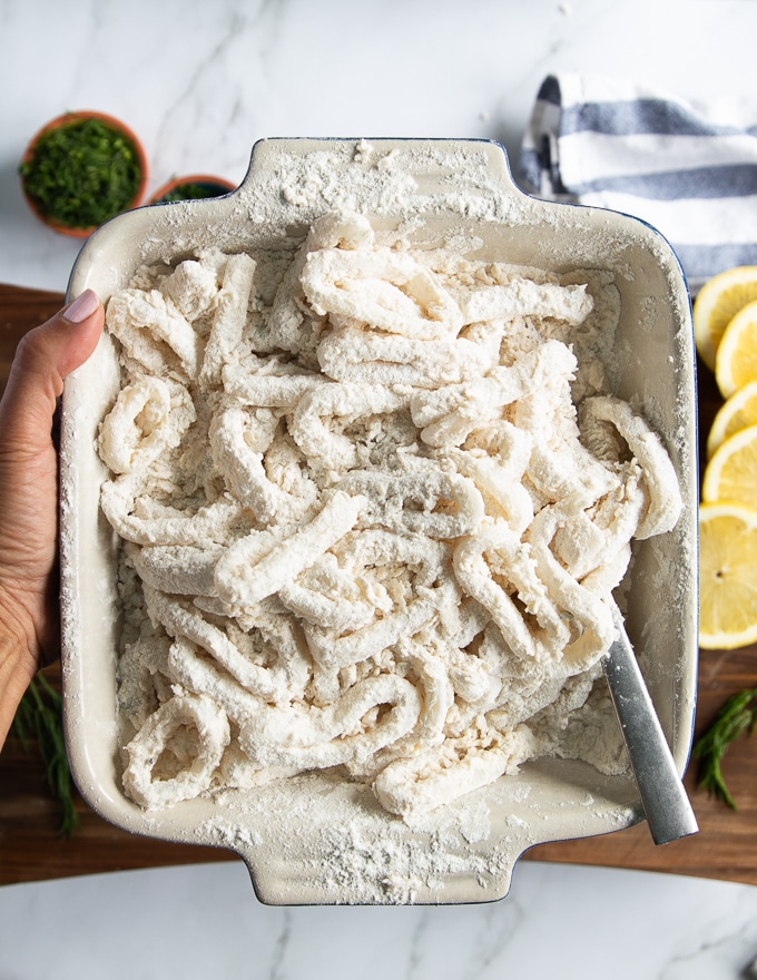 breaded calamari in the flour mixture.